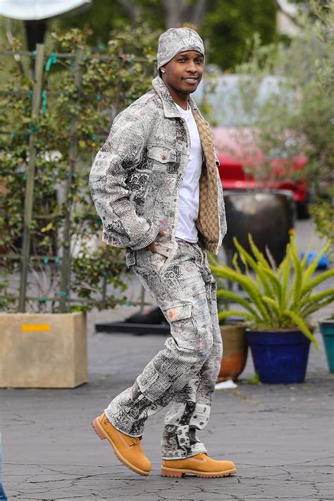 A$AP Rocky Steps Out Wearing Gucci x PROLETA RE ART